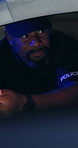 Police officer, car and night with man and stop for drunk driving, speeding and investigation. License check, crime and security with law enforcement and person for dui, patrol and surveillance