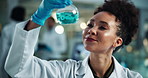 Scientist, woman and chemical in beaker with smile for chemistry, experiment and medical research. Laboratory, analysis and expert with liquid inspection for pharmaceutical or pathology study