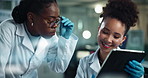 Scientist, women and tablet in lab with partner, coaching and medical research for pharmaceutical development. People, discussion and touchscreen with mentorship, vaccine and happy for study with app