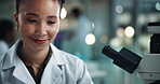 Scientist, woman and microscope with smile, report and chemistry for experiment and medical research. Laboratory, analysis and expert with liquid inspection test for pharmaceutical study solution
