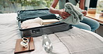 Hands, woman and luggage for packing, suitcase and clothes for vacation, travel or holiday trip. Female person, preparing and home in bedroom as wardrobe, tourist or destination as university student