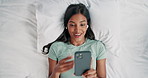 Above, bedroom and woman with smartphone, video call and digital app for communication. House, person and girl with cellphone, connection and discussion with online chatting, conversation and talking