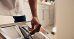 Man, hands and loading dishwasher in home, household responsibility and appliance with dirty dishes. Male person, cleaning tasks and equipment for washing crockery in kitchen, hygiene and routine