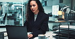 Office, business woman and laptop for typing, research and audit with charts in finance agency. Female person, tech and documents for investment in company for growth, stock market and working late