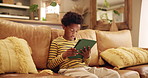 Home, e learning and child with tablet, online and reading of ebook, growth and development with education. Living room, serious and preparing for exam, student and knowledge with app and black kid