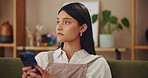 Thinking, phone and typing with woman on sofa for social media, networking app or text response. Idea, contact and search with person and mobile in living room at home for communication, post or chat