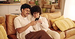 Happy, relax and couple on sofa with phone for social media, watching videos and online shopping. Dating, home and man and woman on smartphone for bonding, relationship and chill together on weekend