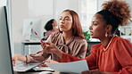 Office, coworking and computer with paperwork, discussion and pointing for teamwork or collaboration. Women, document and technology for brainstorming ideas as creative agency, colleagues or feedback
