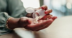 Business woman, hands and container with pills for medication, prescription or dosage at office desk. Closeup, female person or employee with tablets or pharmaceuticals for pain relief or healthcare