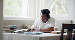 University, library and man with headphones and books for learning, studying and education. School, coffee shop and person listening to music for knowledge, assignment and project with textbooks