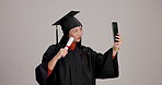 Woman, scroll and university student with selfie in studio for social media post and profile picture. Japanese person, certificate and smile or happy in gray background for qualification or degree 