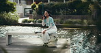 Phone call, relax and woman on vacation, talking and conversation with contact, water and outdoor. Lake, break and person with mobile for communication, travel and chat for trip, smile and holiday