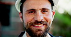 Happy, man and face of construction worker on site for building inspection with city planning. Smile, confident and portrait of male civil engineer with industrial property development project.