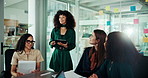 Business women, team and meeting with tablet for presentation, brainstorming or planning in boardroom. Female people, employees or colleagues with technology for briefing, tasks or project discussion