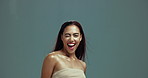 Woman, face and wink for haircare in studio, color treatment and keratin shampoo results for growth. Female person, portrait and playful gesture on mockup background, wind and spin for dermatology