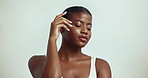 Fabric, black woman and skincare with wellness, health and soft skin with silk or eco cotton sheet. Studio, art and sustainable cosmetics with beauty and glow from treatment and white background