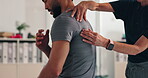 Consultation, physiotherapist and massage man for back pain with shoulder injury treatment and rehabilitation. Patient, professional hands and bone assessment for osteoporosis and physical therapy