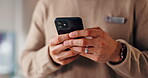 Business man, hands and typing with phone in office for text message, social networking and checking notifications. Professional, employee and smartphone for writing email response and mobile chat