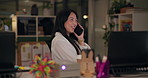 Funny, night and phone call with designer woman in office for communication or web development. Computer, conversation and laughing with Asian employee in creative workplace for negotiation or update