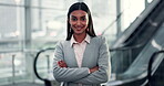 Face, business and woman with confidence on escalator for corporate career, about us and legal advice. Portrait, female lawyer and arms crossed with airport travel, consultant pride and opportunity