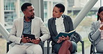 Businessman, woman and queue for interview, talk, and tablet to prepare for recruitment process. People, row and diversity with question, opportunity and onboarding in waiting room with networking