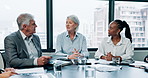 Business people, meeting and office collaboration of account executive and management with paperwork. Boardroom, diversity and proposal planning with conversation, report and finance team at table