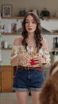 Acting, woman and playing game in home with action description, answer clues and explain with energy. Entertainment, girl and card for challenge, ideas and mime activity for competition and bonding