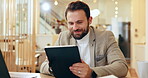 Design, smile and tablet with business man at desk in office for online research or web development. App, social media and website with happy graphic designer in workplace for internet programming