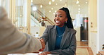 Woman, smile and handshake in office for meeting, job interview and welcome in company. Onboarding, people and shaking hands in lobby for greeting, recruitment agent and conversation for opportunity