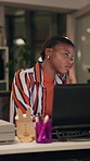 Black woman, tired and bored in office with working late at night as creative designer for agency. African female person, burnout and fatigue as exhausted by project deadline as sleepy, lazy and rest