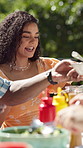 Food, bonding and barbecue with friends in garden for celebration, new years event or lunch. Share, party and eating with group of people on patio of home for summer social, reunion and bbq together
