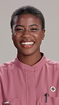 Smile, nurse and face with black woman in studio for healthcare worker, pride and caregiver. Happiness, medical and wellness with person on white background for confidence and occupational therapist