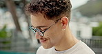 Happy, relax and face of man at hotel for summer vacation, holiday and fun on weekend. Travel, resort and person with smile online for social media, chatting and reading text message outdoors
