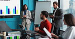 Business people, talking or suggestion in presentation for advice, funding opportunity or b2b graphs. Partnership, investor or budget analyst in office for data analysis, revenue or charts on screen