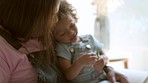 Mother, toddler and girl with crayons at home for playing or fun and bonding with communication. Relax, sitting and parent with child and crayon for bond and playful activity at house for learning.