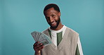 Happy, black man and cash with money fan for financial freedom, wealth or stability on a blue studio background. Portrait, male person or African model with euro bills for salary or profit on space