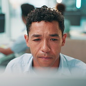 Developer, confused or man reading on computer for research, project or ...