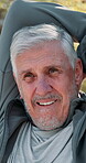 Senior man, stretching and fitness in nature with warm up, muscle tension relief and start exercise. Elderly person, face or outdoor with thinking for wellness, retirement activity or physical health