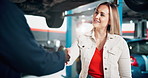 Client, woman and mechanic handshake at garage, price negotiation and thank you for service. Repair shop, maintenance and discussion on motor engineering, welcome customer and meeting for helping