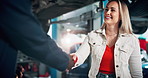 Mechanic, woman and handshake for car repair shop, maintenance or calibration garage. Greeting, repairman and service welcome with inspection for quote, quality control or auto engineer workshop