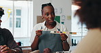 Pottery painting, teacher and woman in workshop with color palette for learning art, craft or teaching design. Potter, ceramic and glaze for creative decor choice, clay and explain process in class