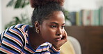 Bored, depression and thinking with woman on sofa in living room of home for loss or regret. Grief, moody and sadness with unhappy person in apartment for disappointment, memories or nostalgia