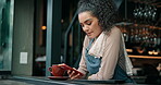 Phone, waitress and thinking with woman in cafe for restaurant promotion, social media post and chat. Hashtag campaign and customer engagement person in coffee shop for loyalty program sign up