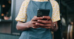 Phone, waiter and hands of person in cafe for restaurant promotion, social media post or chat. Hashtag campaign, customer engagement and closeup of barista  in coffee shop for loyalty program sign up