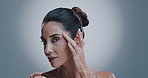 Wrinkles, skincare and face of mature woman in studio for wellness, beauty and facial treatment for anti aging. Dermatology, gray background and portrait of person for cosmetics, spa and skin texture