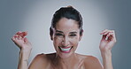 Laughing, face and woman in studio for skincare, dermatology and wellness with confidence for self care. Portrait, mature person and benefits with beauty for cosmetics, anti aging and gray background