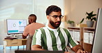 Typing, thinking and man in office with computer for data analysis, growth or development. Research trends, web analyst or consultant in coworking space for ideas in online business intelligence plan