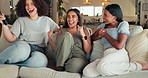 Happy women, winning and watching tv with remote on sofa for support, fans or online subscription at home. Female people, group or bonding with smile on couch for good news or entertainment at house