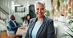 Smile, confidence and face of mature woman in meeting for leadership, planning or growth. Businesswoman, project director or development consultant in office with pride, business people or management