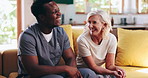 Laugh, talk and senior woman with nurse for support, help or funny joke in home for wellness. Caregiver, retirement or communication with happy patient for story, medical healthcare or geriatric care